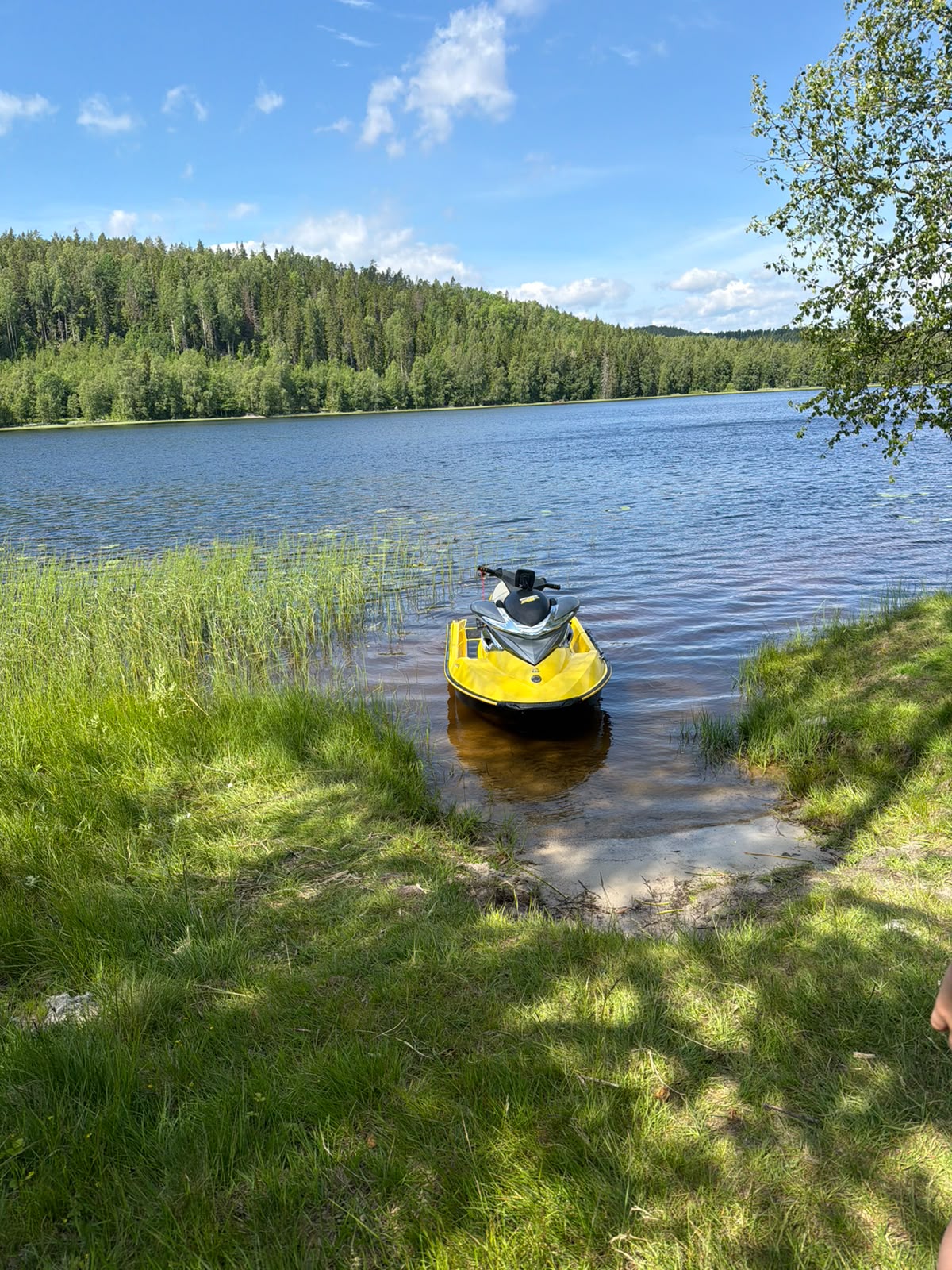 Sea-Doo jet ski ready at the shoreline